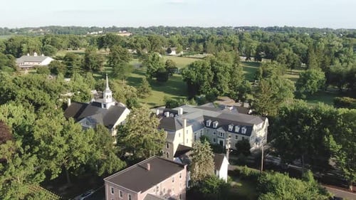 Aerial of school and church in small town community in Pennsylvania