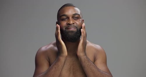 Man Massaging Face