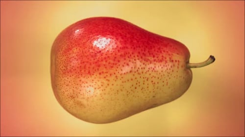 Super Slow Motion of Explosion Pear and Burst Juice and Slices