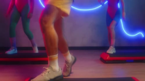 Energetic Step Aerobics Class with Retro Style