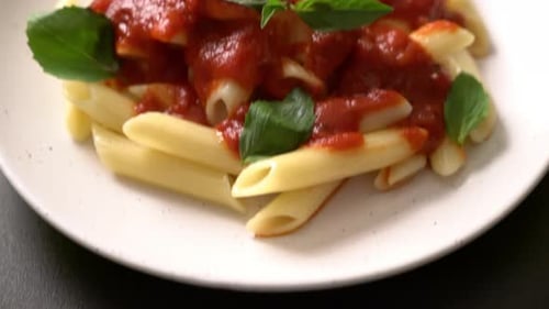 Penne pasta in tomato sauce - Italian food style