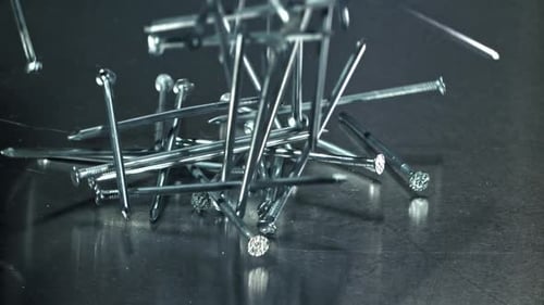 Nails Fall on a Metal Table Filmed on a Highspeed Camera at 1000 Fps