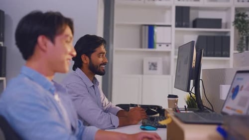 Two Asian young businessman working in the office. Corporate of modern colleagues concept
