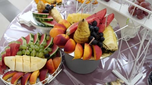 F82. Fruit table. Grapes, pineapples, oranges, tangerines, etc. Buffet table design.
