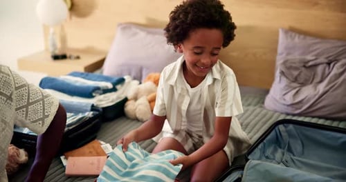 Dad, child and packing suitcase in home for holiday trip, weekend getaway