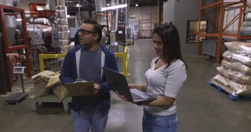 Coffee Roaster Managers Talking Meeting in Food Production Plant 10 Seconds or Greater