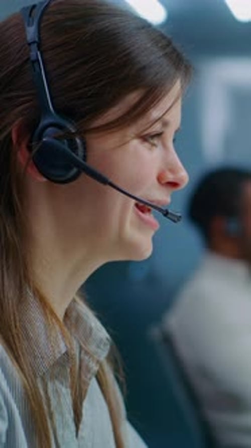 Woman Wearing Headset Speaking at Work