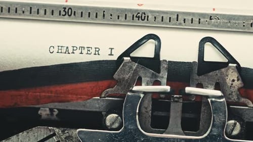 Tapez du texte sur une machine à écrire vintage, chapitre un