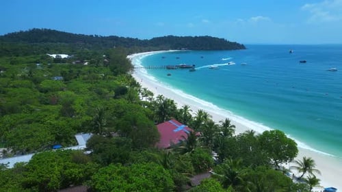 Cambodia Tropical Huts on beach turquoise water. Wonderful aerial view flight drone