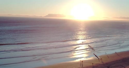 4k drone footage of a beautiful beach at sunset