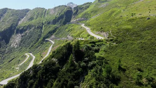 Spectacular Winding Mountain Pass Road Scenic Alpine Journey Aerial View
