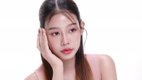 Close up portrait beautiful young Asian woman with healthy facial skin.