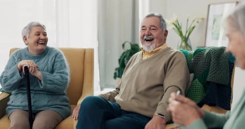 Senior Adults Enjoying Friendship and Laughter at Home