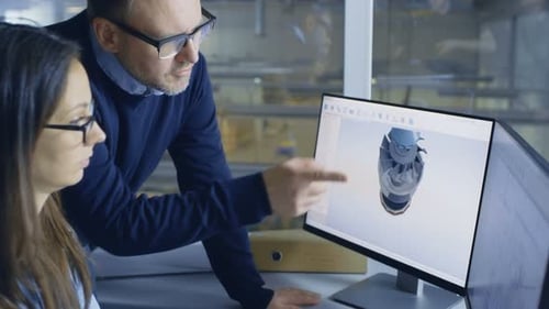 Female Industrial Engineer and Male Project Manager Work on 3D Turbine/ Engine Model in Her CAD Sof