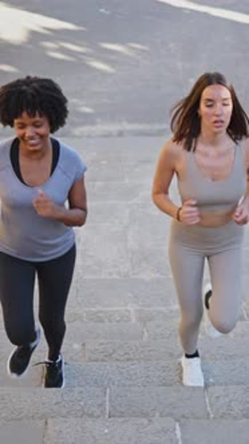 Women Jog Up Urban Stone Steps, Fitness