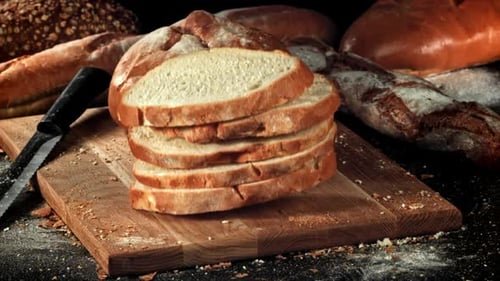 Sliced Bread Falls Onto a Cutting Board Filmed on a Highspeed Camera at 1000 Fps