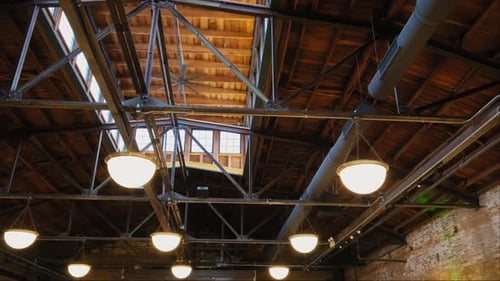 Rustic Ceiling with Metal Beams and Lights