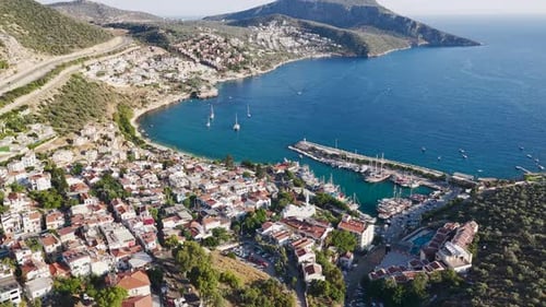 Aerial Video of Boats Floating Near Small Marina and Beach