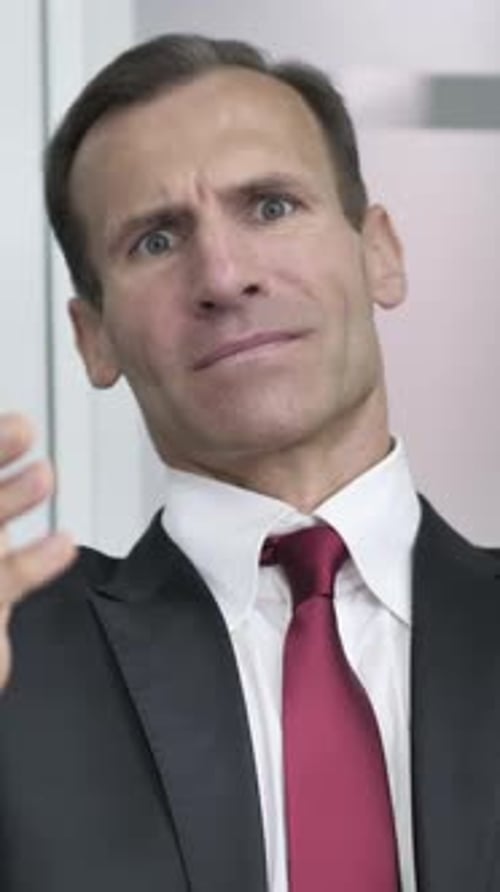 Businessman Upset by Loss in Business, Vertical Video