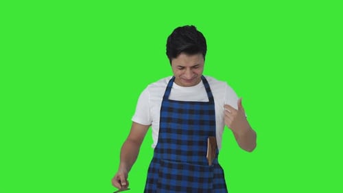 Indian cook tasting bad food Green screen