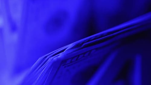 Close up of counting money in special machine. Currency financial banknote counter.