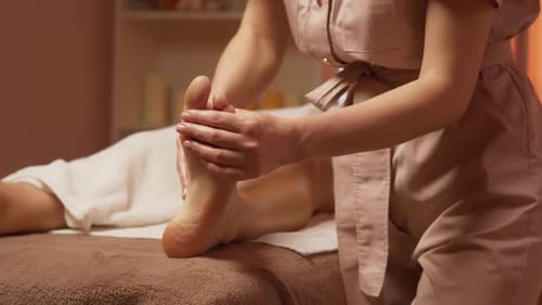 Relaxing Foot Massage in Spa Environment