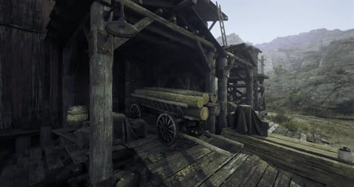 Rustic Wood Storage Area Nestled in a Mountainous Landscape During the Day