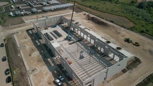 Construction of Warehouse Industrial Building on Light Gauge Framing Above View of Drone