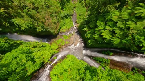FPV Drone Dive Near the Cascading Fiji Waterfalls in the Lush Jungle in Bali