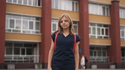 Teen Girl in a Front of the School