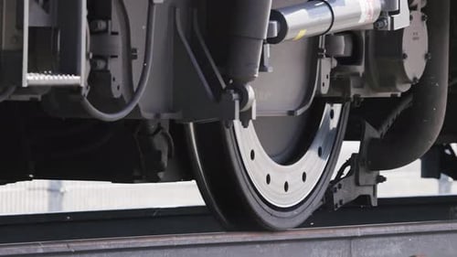 train wheels passing over the railway, closeup view in slowmotion