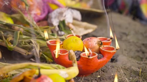 Diwali Offering with Clay Lamps and Fruits