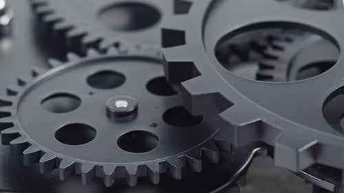 Black Cog Gears Turning Slowly And Accurately