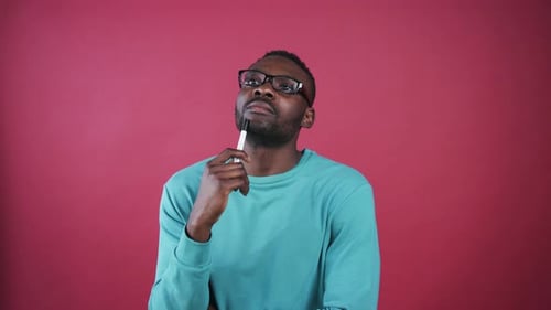 Man Thinking with Pen