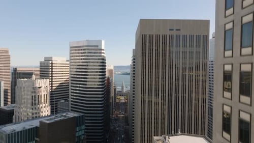 Aerial Ascending Footage of Downtown Office Buildings in Financial District Revealing Panoramic View