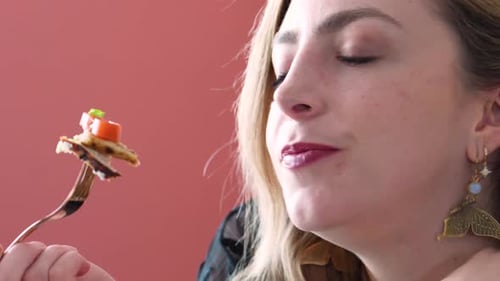 Caucasian Woman Having A Nice Conversation While Eating In A Restaurant. - Closeup Shot