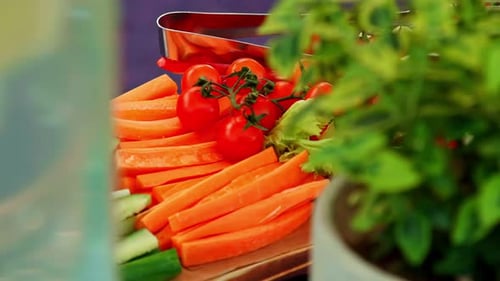 Bokeh Shot of Cut Vegetables with Plant Sharpening in Foreground