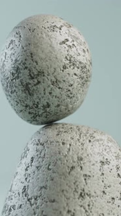 Textured Stone Spheres Balancing Smooth Loop Animation