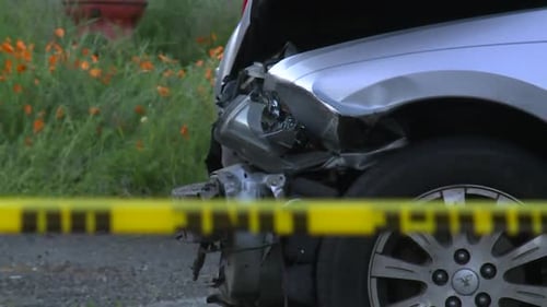 RACK FOCUS ON FRONT END CAR CRASH