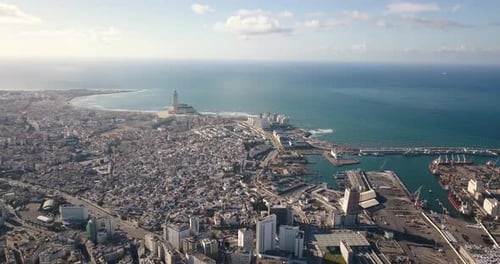 Aerial View of Coastal City with Mosque and Harbor