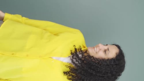 Vertical video of Young woman exploding with anger.