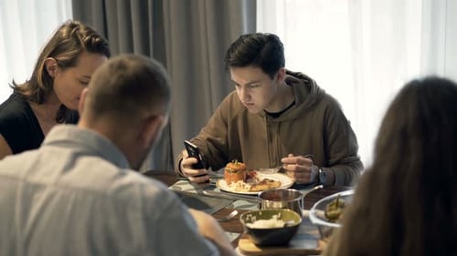 Family meal at home in dining room