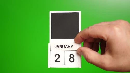Hand Sets January 28th Date on Calendar