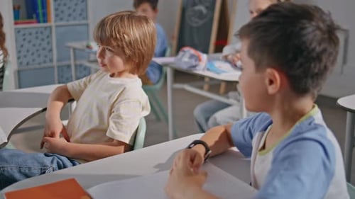 Happy Children Smile in a Bright Classroom