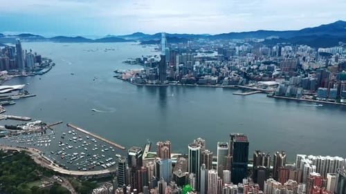Hong Kong urban cityscape aerial skyline panorama timelapse at night pan up