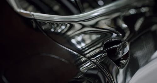 Closeup of Black Shiny Car Door with Handle