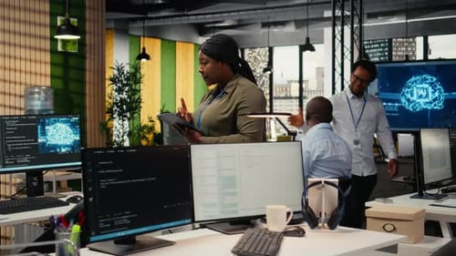 Software Developers Working in AI Startup Training Predictive Models