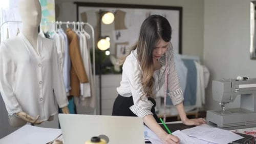 Designer make apparel at tailor workshop.