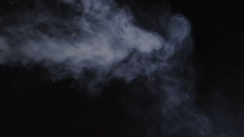 Swirling White Smoke Against a Black Background