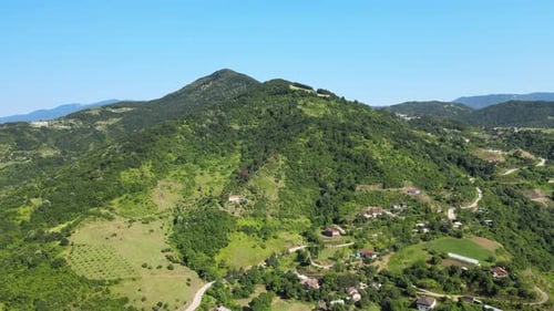 Lush Green Mountain Village Aerial View